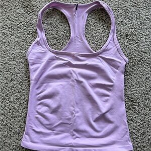 Alphalete Glass Tank